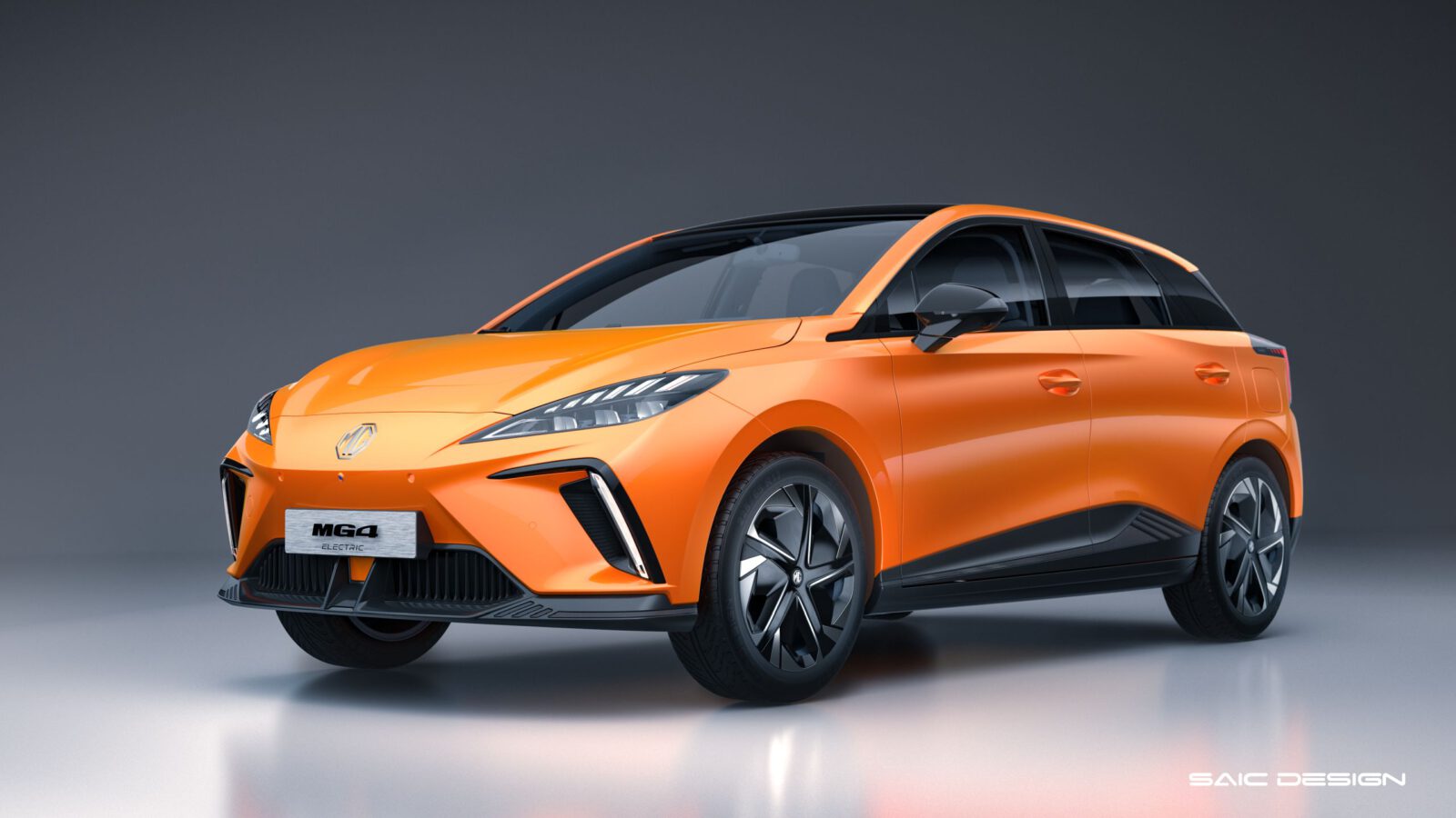 A bright orange MG4 electric hatchback is shown in a studio setting, emphasizing its sleek, modern design and aerodynamic lines with black accents and distinctive alloy wheels.