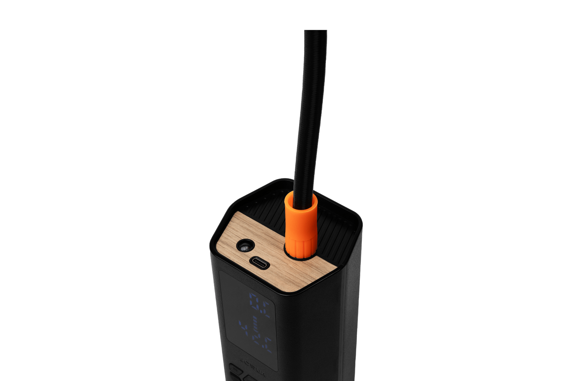 Close-up of the JOWUA Portable Air Compressor for Tesla & Tire Valve Caps Combo, showcasing its black electronic body with a wooden top panel reminiscent of Tesla's sleek design. It features a digital display and a cable connector with an orange sleeve near the connector, highlighting high-speed charging efficiency.