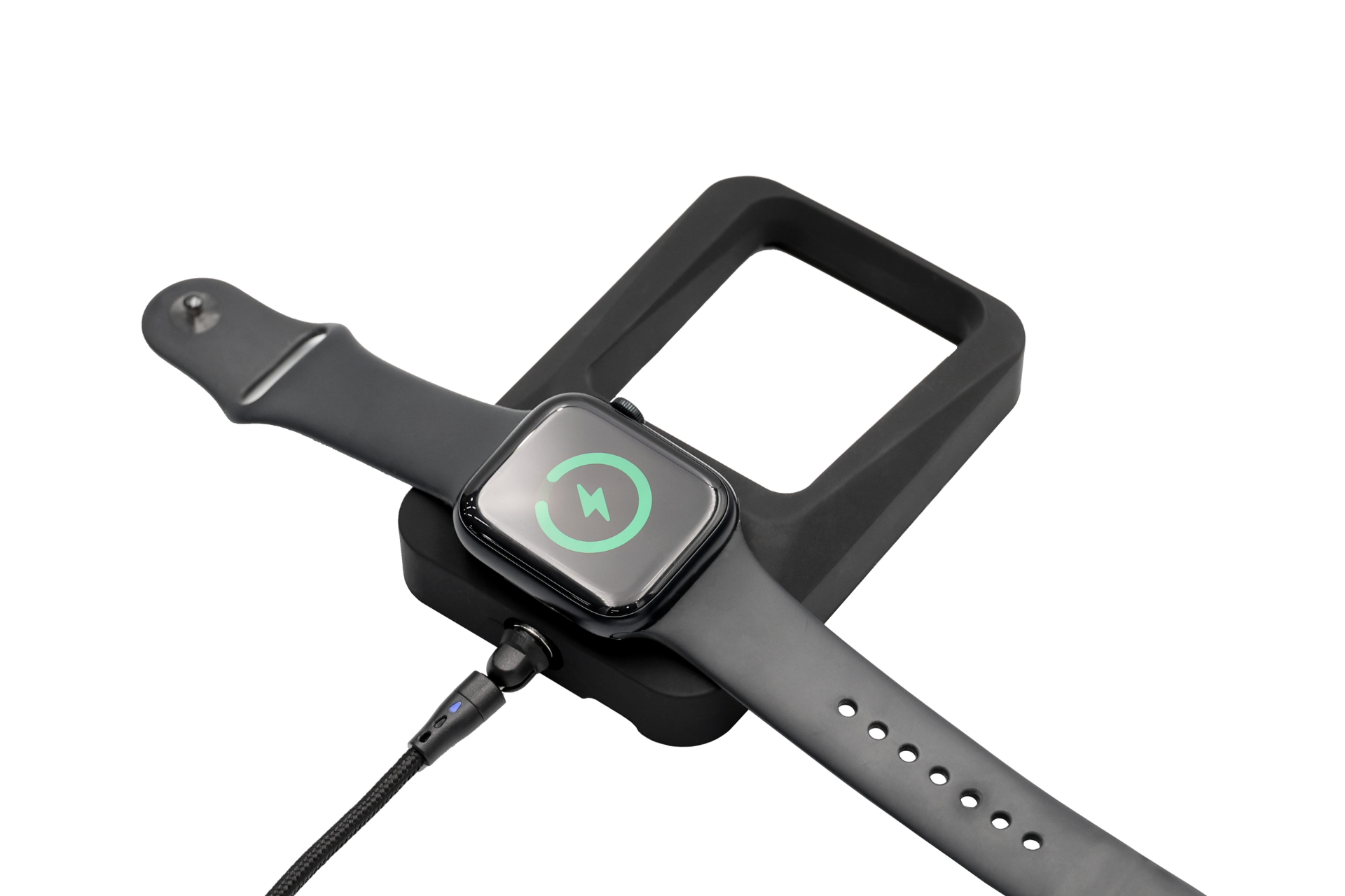 The JOWUA Tesla Everyday Essentials seamlessly charges your Apple devices; a black smartwatch with a charging symbol rests on its MagSafe-compatible black dock, connected to power, all set against a white background.
