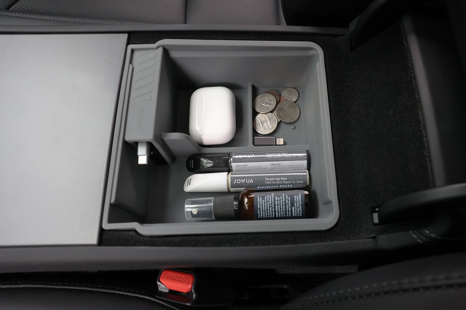 The JOWUA Center Console Set with Power HUB for Model Y L (Premium & Performance 2025-2026+) features separate compartments to organize coins, AirPods, lip balms, a spray bottle, and a USB charger—keeping essentials tidy and within reach.