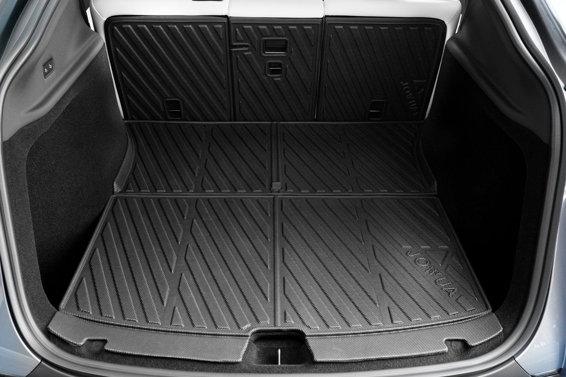 Open the trunk of a Model Y (Juniper 2025+) featuring JOWUA’s EasyShield Waterproof Trunk Liner + Rear Seats Back Cover Bundle with black, textured TPE mats, diagonal lines, and a "JOWUA" label. Car seats are visible in the background.