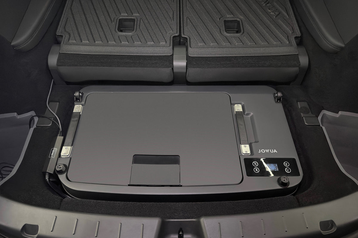 A JOWUA Car Refrigerator for Tesla Model Y L (2026+) installed in a vehicle trunk, featuring a digital temperature display, intelligent dual-mode cooling, and controls on the top panel.