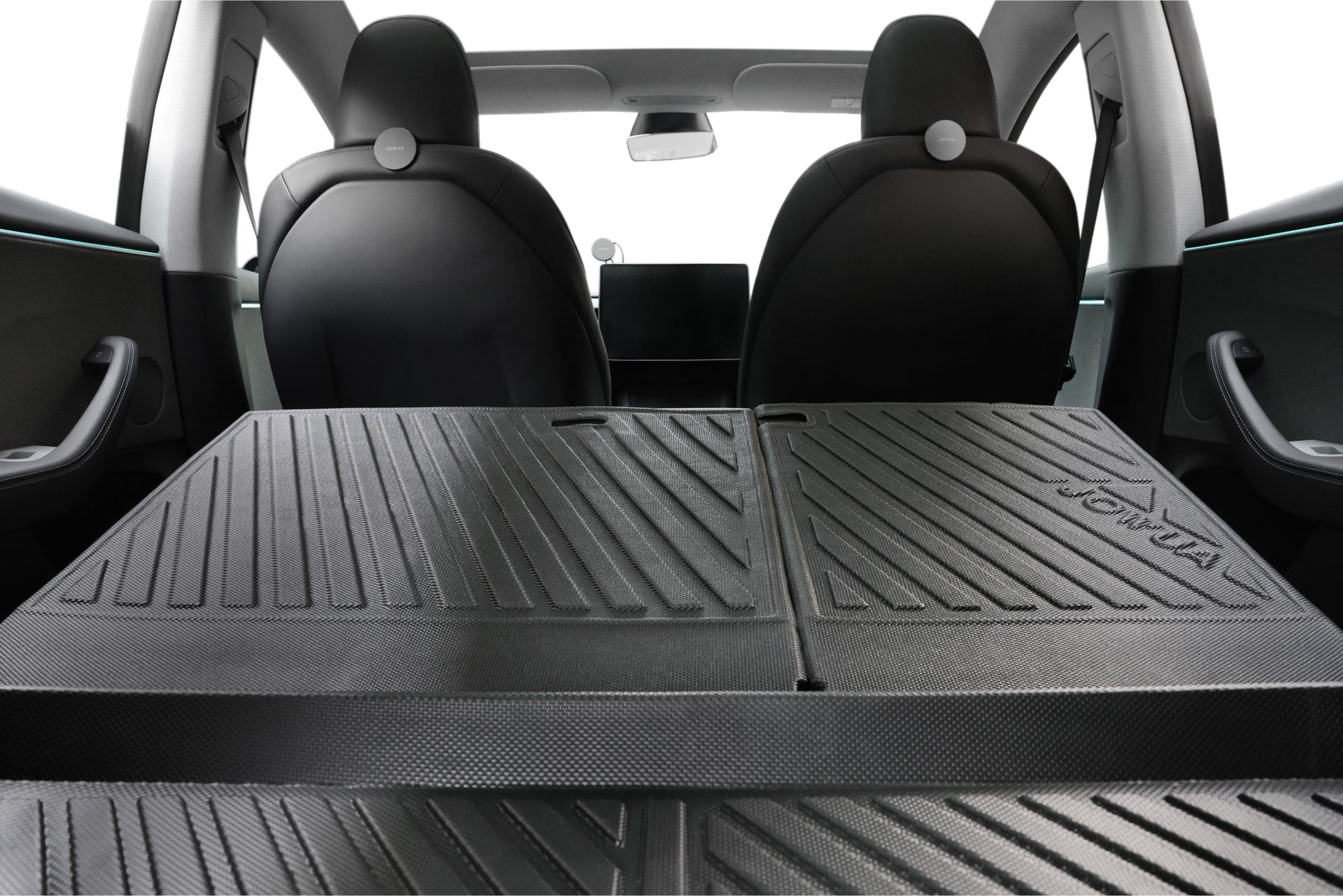 The trunk view shows rear seats folded flat for extra cargo space with the JOWUA Model 3 All Weather Trunk Combo (Model 3 Highland, 2024+), while front seats, dashboard, and infotainment screen appear in the background.