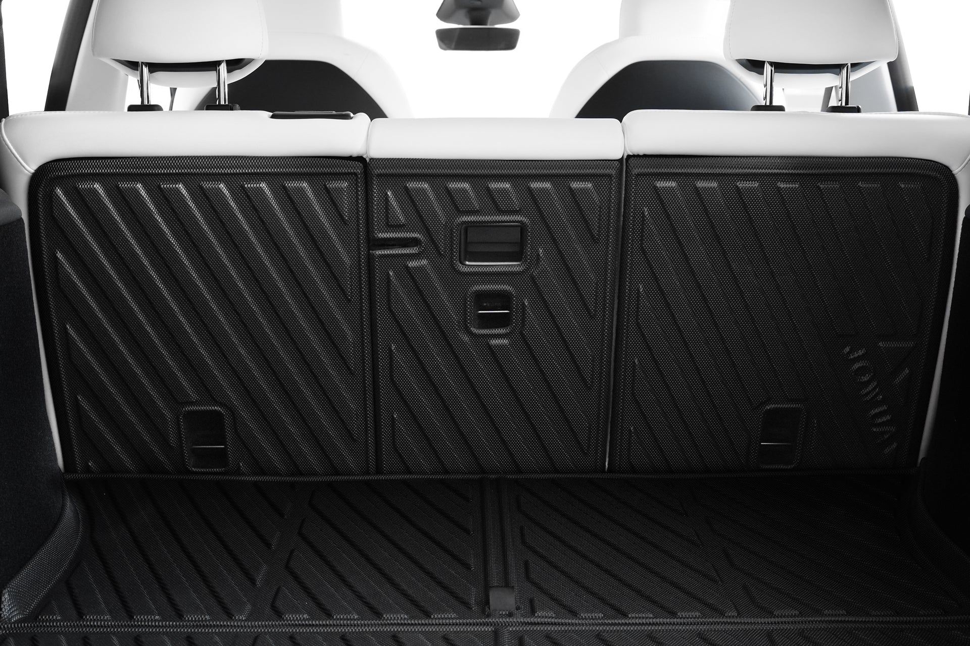 Close-up of a JOWUA Model Y (Juniper 2025+) EasyShield Waterproof Trunk Liner + Rear Seats Back Cover Bundle in black TPE, protecting the spacious, empty trunk and white leather rear seats.