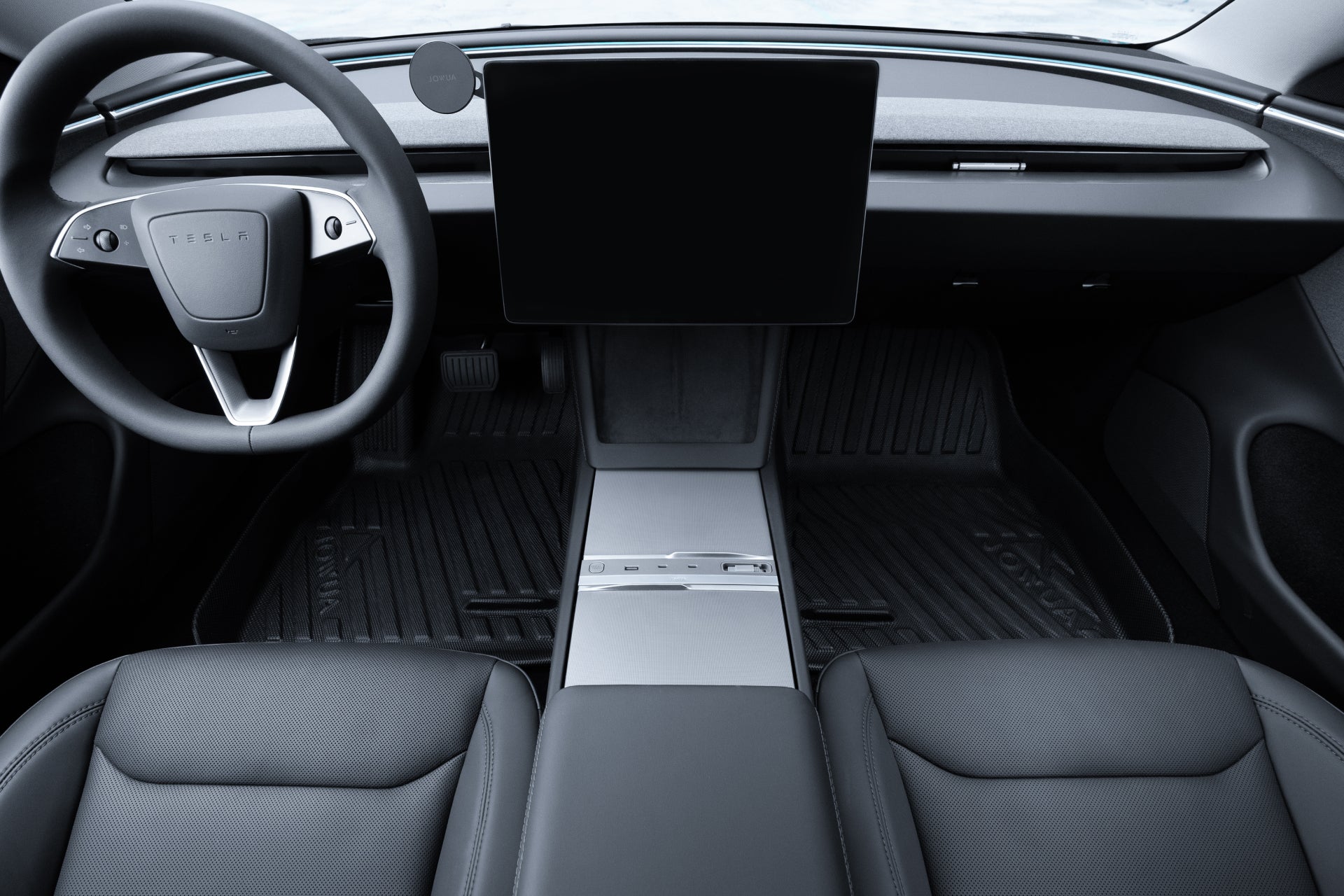 The interior of a Tesla Model 3 2024 showcases a minimalist dashboard, large touchscreen, black leather seats, JOWUA All-Weather Floor Liners (Model 3 2024+ Highland), visible steering wheel, and a MagSafe Tissue Box Cover.