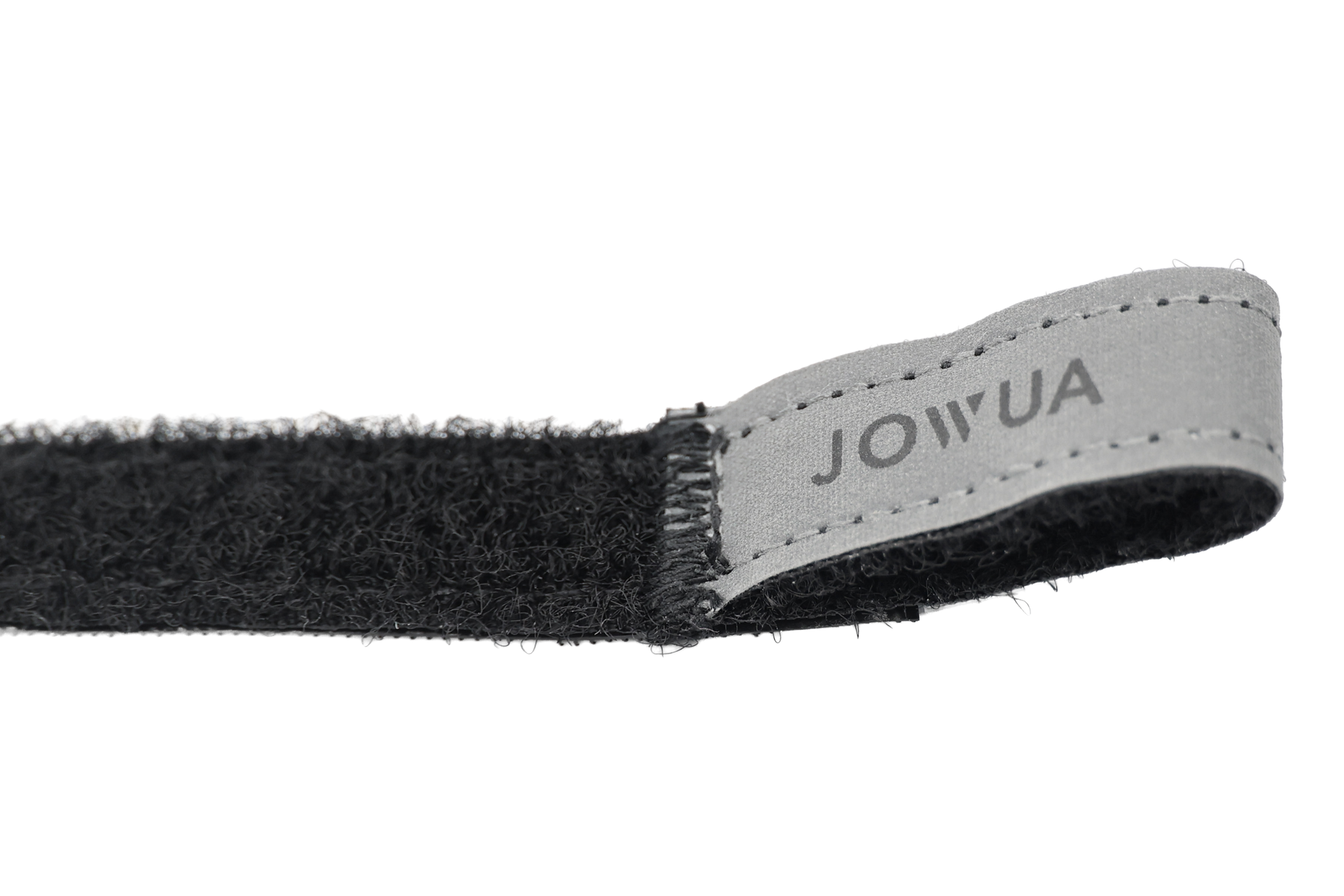 A close-up of JOWUA's Reflective Rear Door Emergency Release Strap (Model 3 Highland, 2024+ / All Model Y), featuring black fabric, a sewn-on "JOWUA" tag, and an injection-molded hook ideal as a Tesla rear door emergency release.