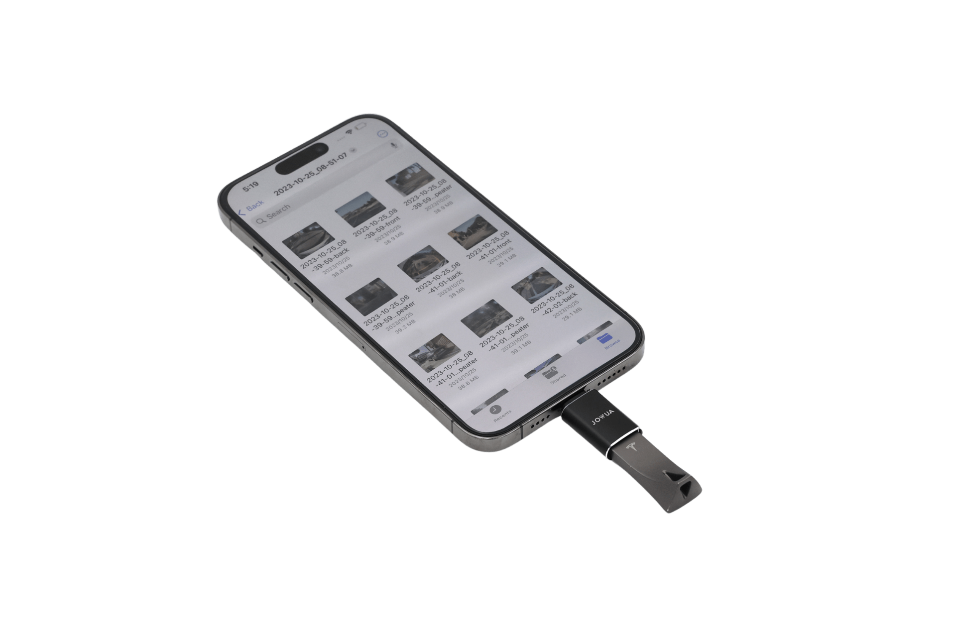 A smartphone shows a photo gallery with a black JOWUA Sentry & DashCam Adapter Set OTG (USB-A to Type-C & Lightning) connected to its charging port on a plain white background.