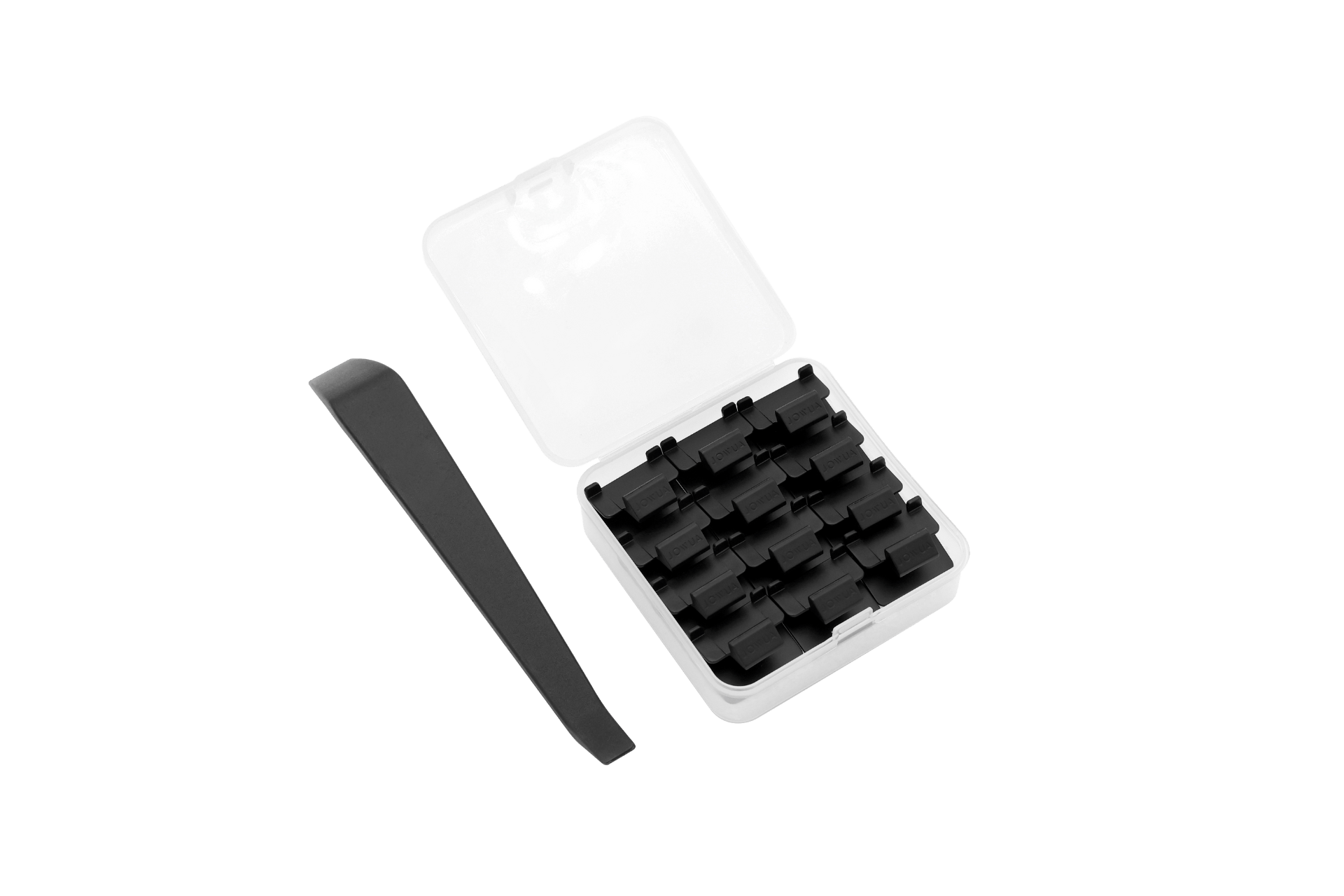 In a small, open white plastic case, a set of black mechanical keyboard keycaps is neatly arranged. Nearby, a black keycap puller tool lies delicately against the dark background, reminiscent of JOWUA's Sunshade Clips.
