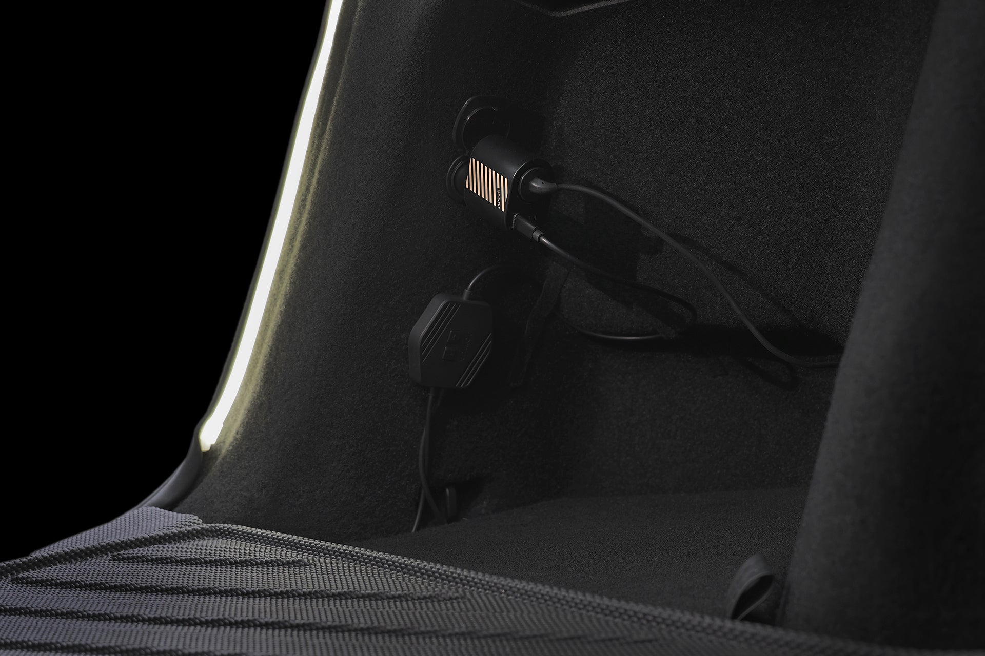 Enhance your Tesla Model Y trunk lighting with the JOWUA Teslussy Light, a Type-C ambient LED and 3-in-1 car charger featuring a magnetic induction auto switch for easy installation.
