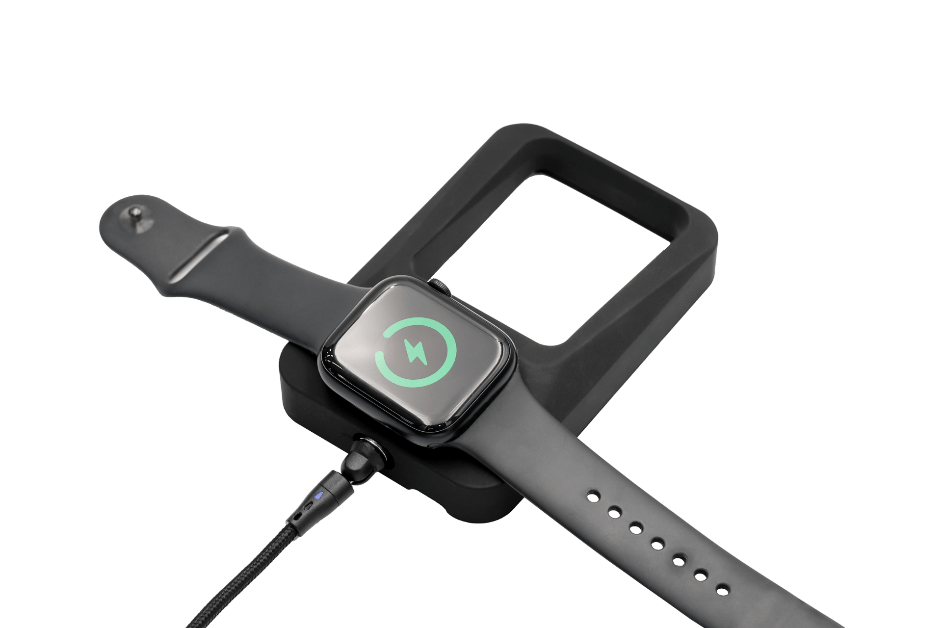 A black smartwatch charges on a rectangular black dock from JOWUA’s iPhone 17 Release Bundle, connected by a cable. Next to it is a MagSafe clear iPhone 17 case, with the watch display showing a green charging icon on white.