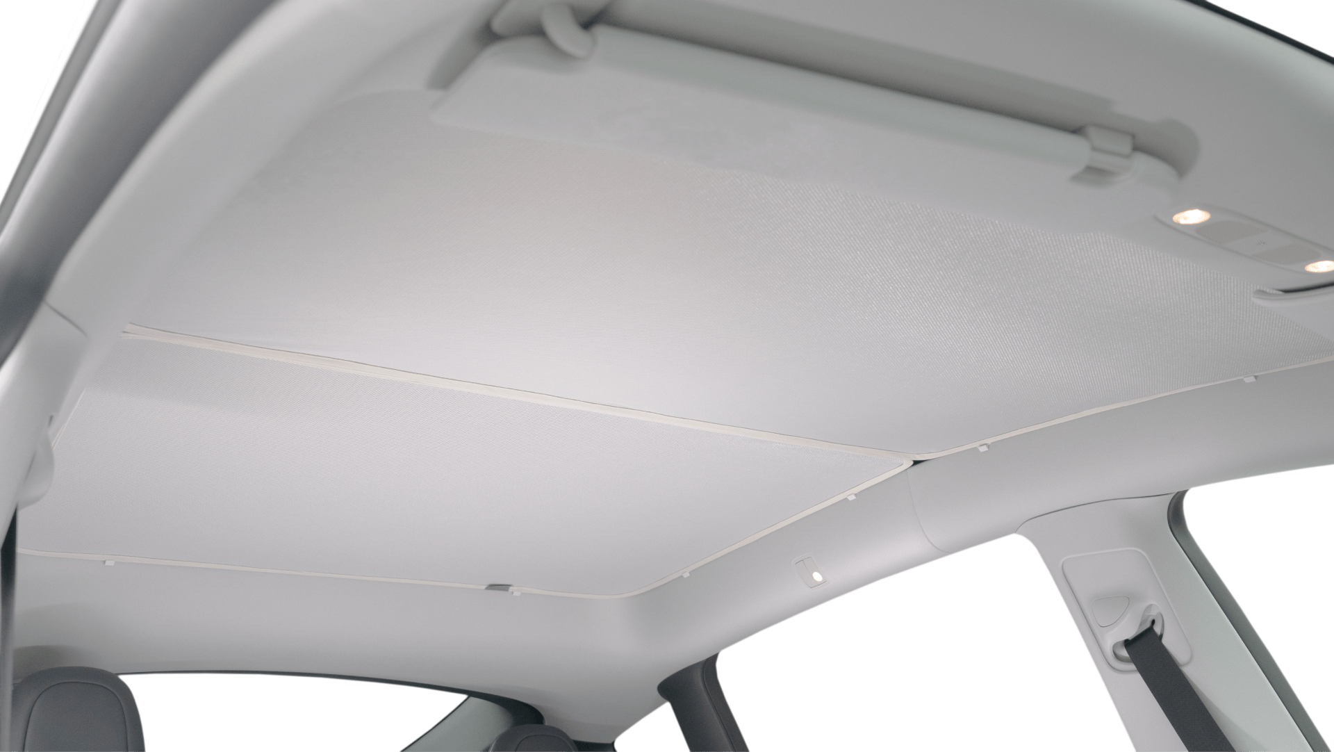 A back-seat view of the JOWUA Model Y (Juniper 2025+) Glass Roof Sunshade with grey trim and built-in overhead lights, closed for UV protection.