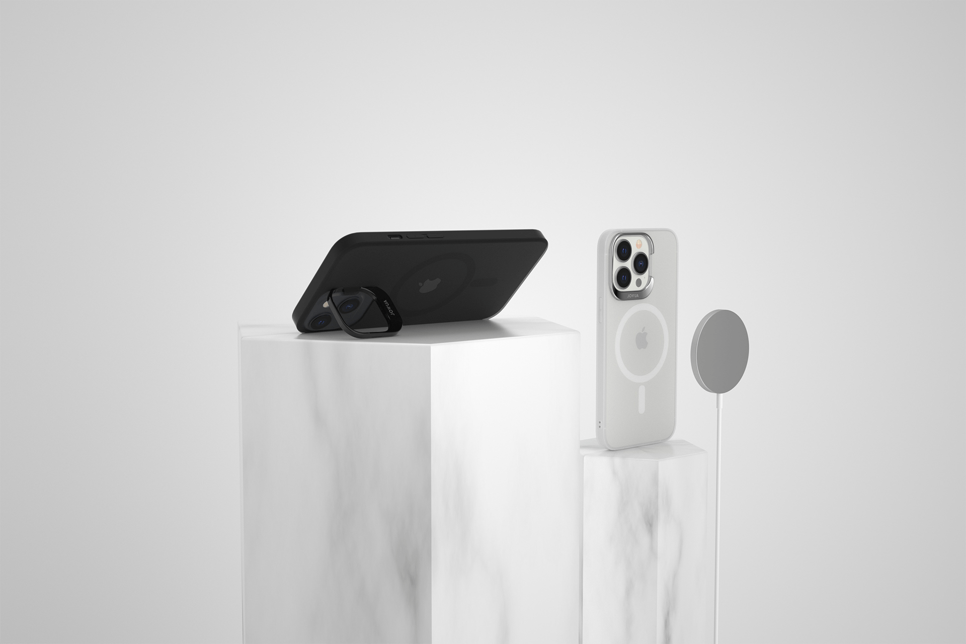 Two smartphones with detachable lenses positioned on marble pedestals. The left phone is horizontally placed with a black matte finish, and the right phone is vertically oriented with a light-colored accessory attached.