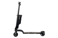 A sleekly designed black folding electric scooter by JOWUA stands upright, featuring a compact frame with small wheels and a standing platform. It includes a detachable battery for added convenience, and the brand name is prominently displayed on the vertical post.