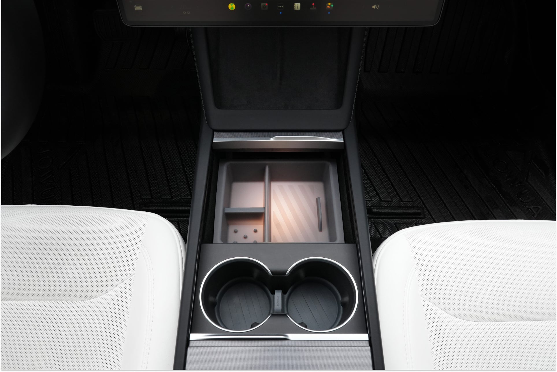 Interior view of a Tesla Model 3 featuring JOWUA's Center Console Set (Tesla Model 3 Highland 2024+), which includes two cup holders with stylish cup coasters and a storage compartment enhanced by a silicone organizer. The seats showcase white upholstery with a textured pattern, complemented by the dashboard and floor mats that elevate the sleek, modern design.