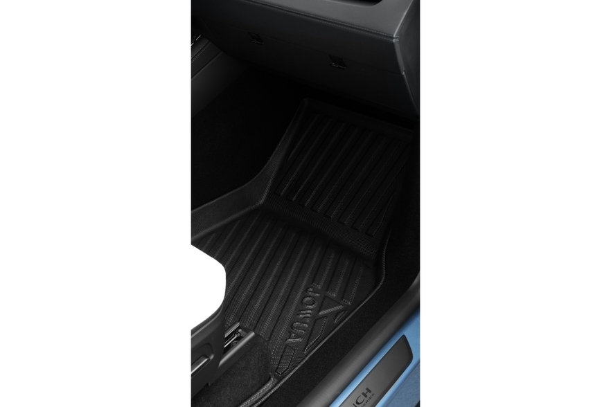 A close-up of JOWUA All Model Y All-Weather Floor Liners Combo in black, designed for 2021-2025 Juniper Tesla Model Y, shown in the front passenger footwell—perfect for those wanting premium protection and quality accessories.