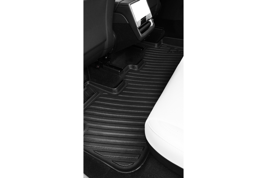 The JOWUA All Model Y All-Weather Floor Liners Combo (Juniper 2025+ / 2021-2024) features black, textured rear seat liners that fit perfectly between front and rear seats to protect your Tesla Model Y’s carpet from dirt and spills.