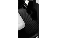 JOWUA All Model Y All-Weather Floor Liners Combo (Juniper 2025+ / 2021-2024) in sleek black is installed in the rear seat area of a Tesla Model Y with white leather seats and a digital center console visible.