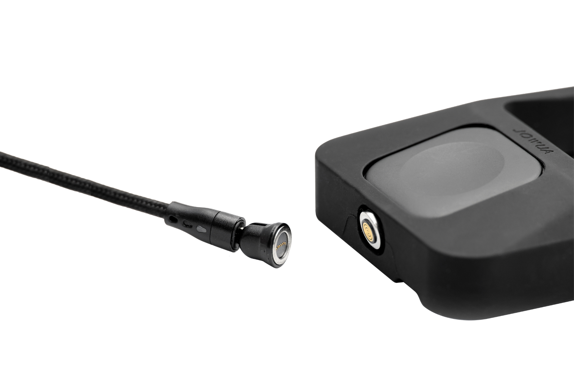 A close-up of JOWUA’s Power Dock Combo, an Apple accessory charger for Tesla, highlights its black magnetic connector and matching charging port in a sleek, Tesla-like design against a white background.