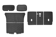 The JOWUA All-in-One Interior Upgrade Set for Model Y Juniper (2025+) includes six black, textured floor liners and mats with diagonal grooves and an embossed logo—premium accessories neatly arranged on a white background.