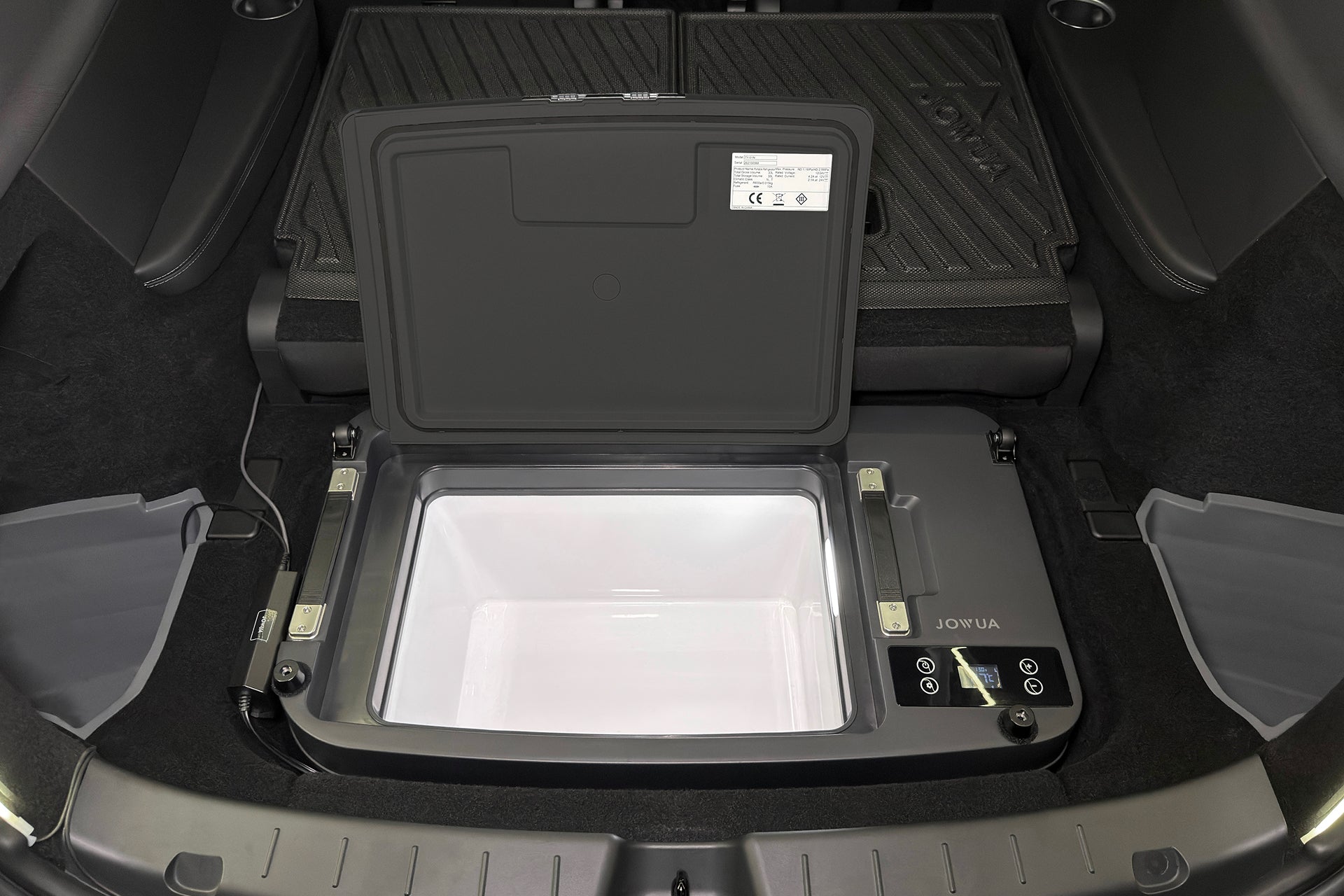 A JOWUA Car Refrigerator for Tesla Model Y L (2026+) with an intelligent dual-mode cooling system and open lid, installed in the trunk of a vehicle.