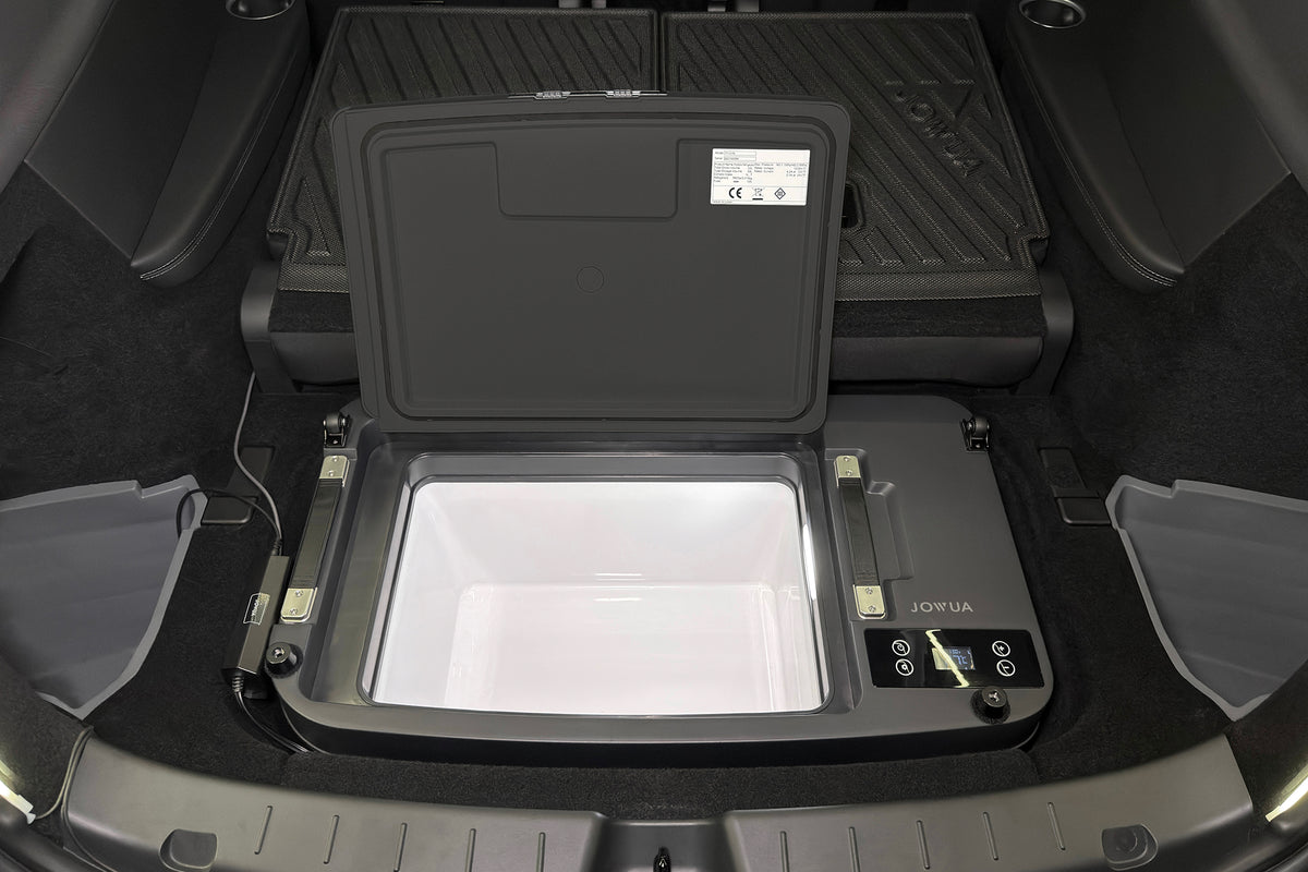 A JOWUA Car Refrigerator for Tesla Model Y L (2026+) with an intelligent dual-mode cooling system and open lid, installed in the trunk of a vehicle.