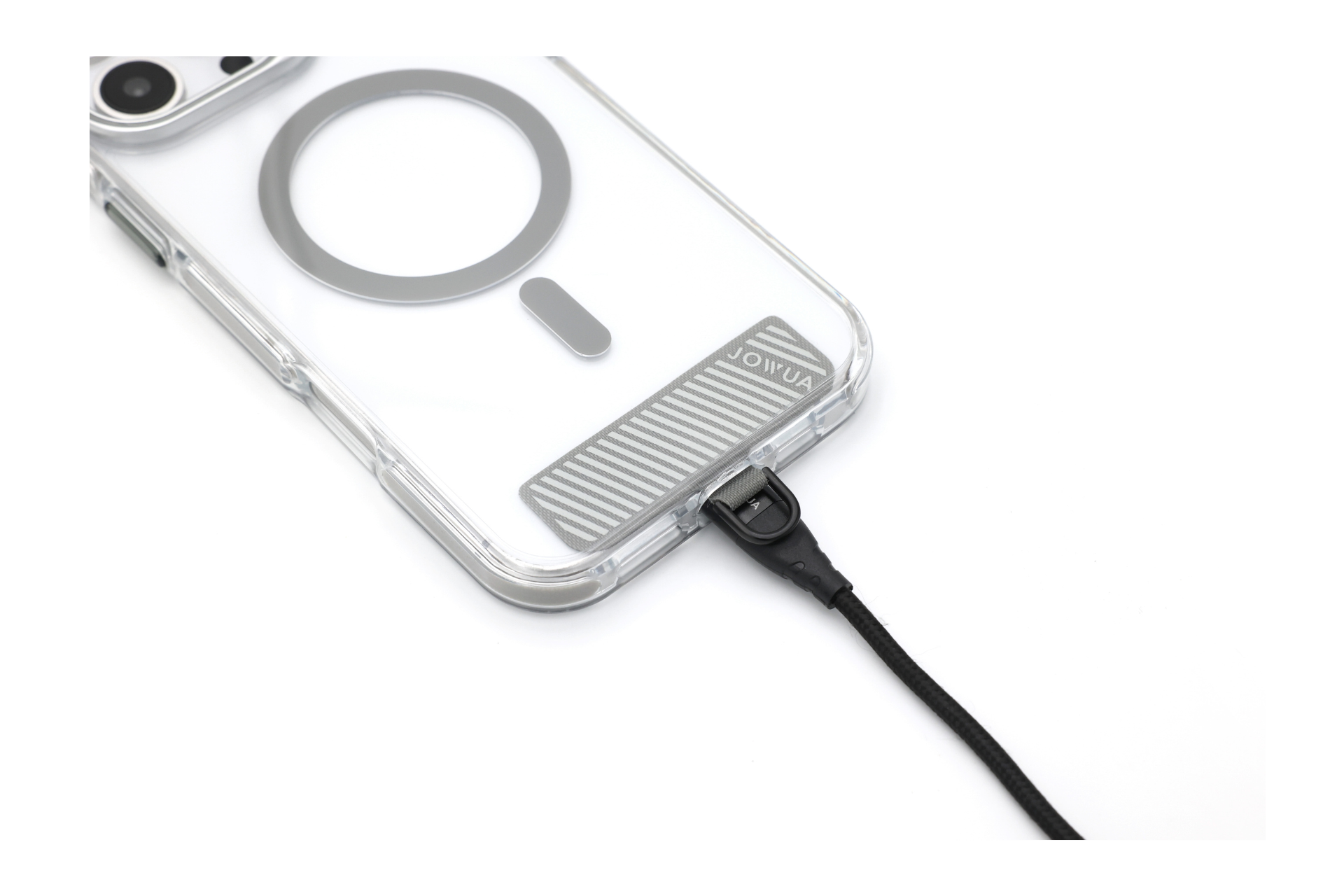 The JOWUA iPhone Case for Tesla Car Mount with MagSafe + Phone Tether Tab Set (iPhone 16 Series) provides rugged protection with a circular design and includes a small raised strip. It is connected to a black lanyard through a corner loop, and the phone