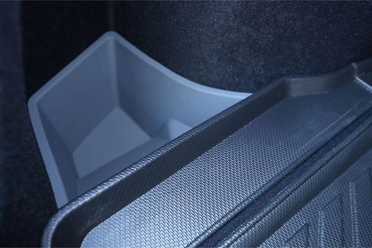 Close-up of JOWUA Trunk Storage Bins for Tesla Model 3 Highland (2024+), showing a textured black liner and a light gray silicone bin neatly placed in the trunk corner.