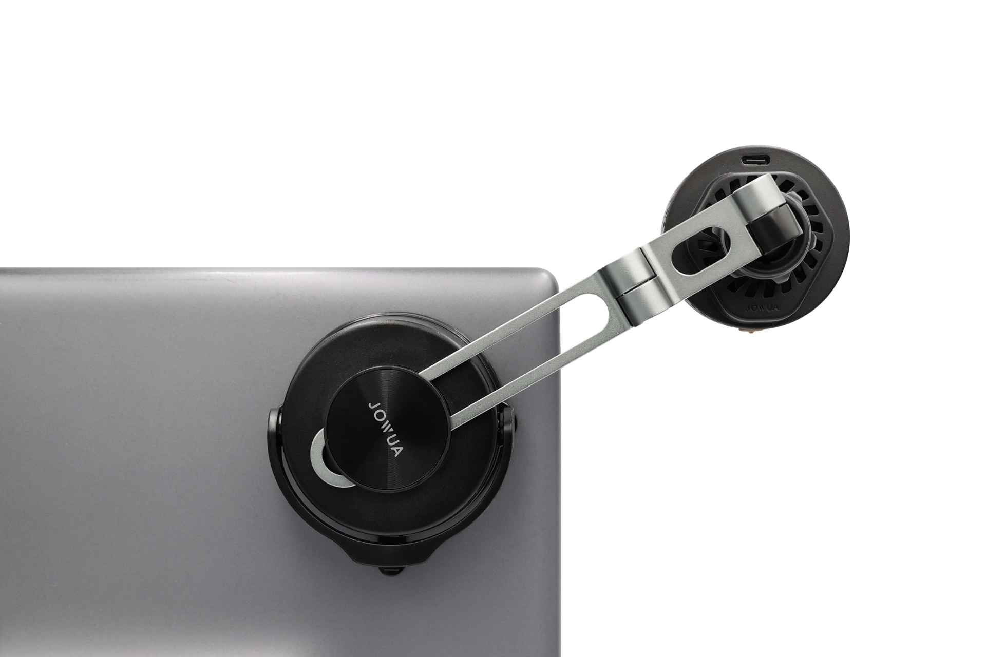 A close-up of a laptop with a JOWUA Active Cooling 6D Tesla Compatible Invisible Foldaway Car Mount Qi2 Wireless Charger (MagSafe) attached to its lid, viewed from above on a white background.