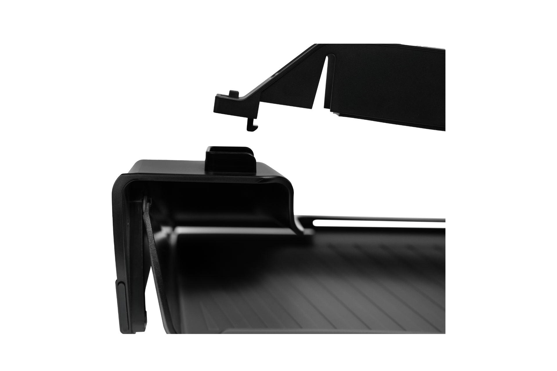 Close-up of a black interlocking component with a hook and slotted edge—part of JOWUA