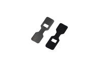 Two guitar strap locks in black, featuring squarish openings in the center and set against a white background, boast a textured appearance that mirrors the precision found in Tesla Model 3 accessories, dedicated to securely fastening guitar straps.