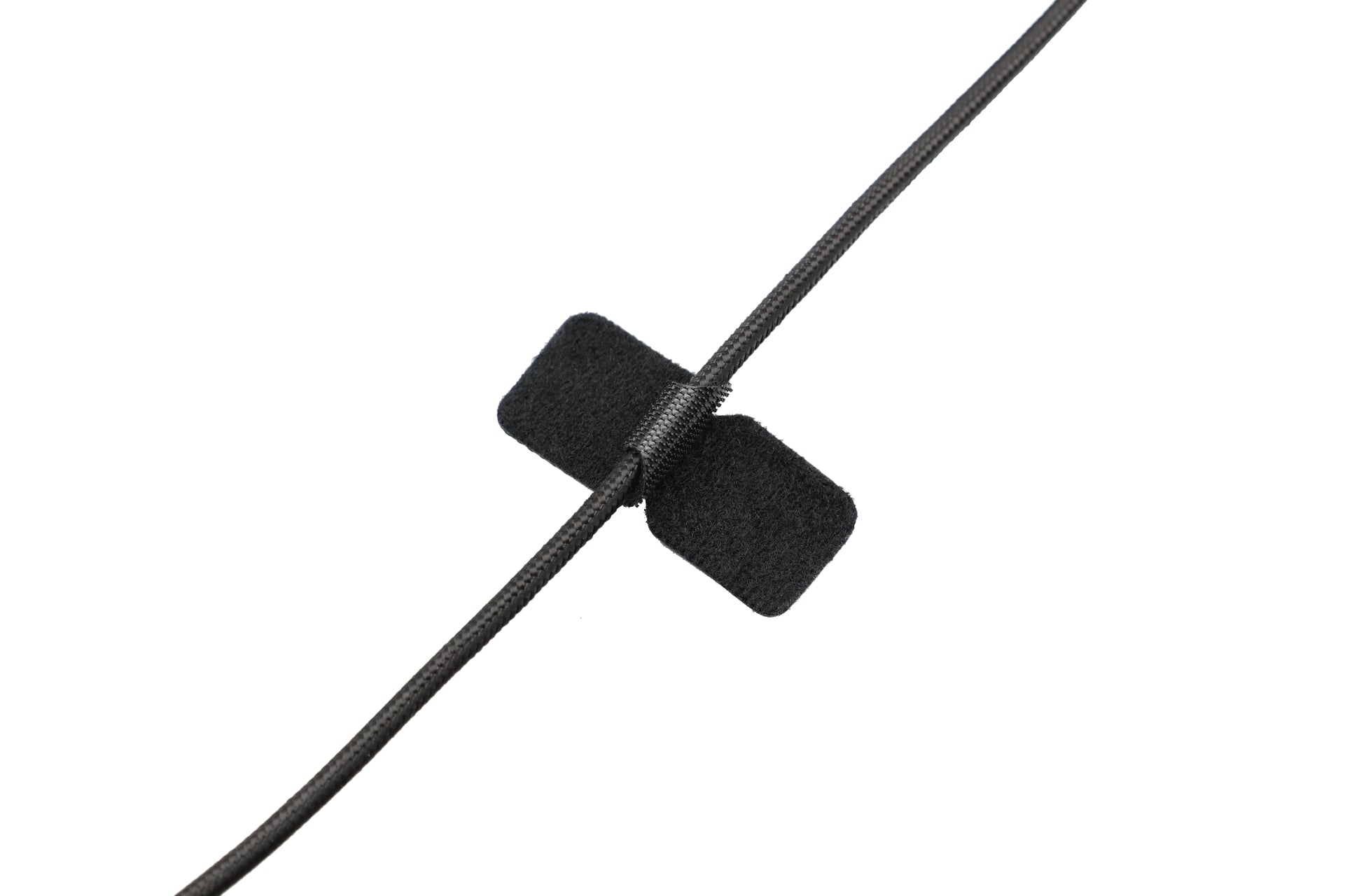 The JOWUA Magnetic Charging Cable USB-C to USB-C (1M-1.8M), in black and neatly secured with a Velcro strap against a white background, makes an ideal addition to your Tesla Model 3 accessories.