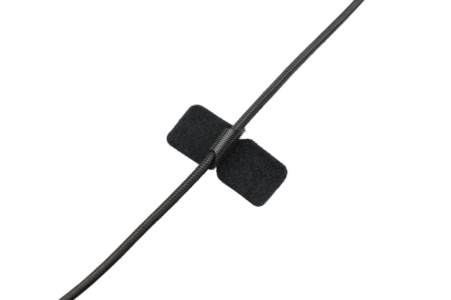 The JOWUA Magnetic Charging Cable USB-C to USB-C (1M-1.8M), in black and neatly secured with a Velcro strap against a white background, makes an ideal addition to your Tesla Model 3 accessories.