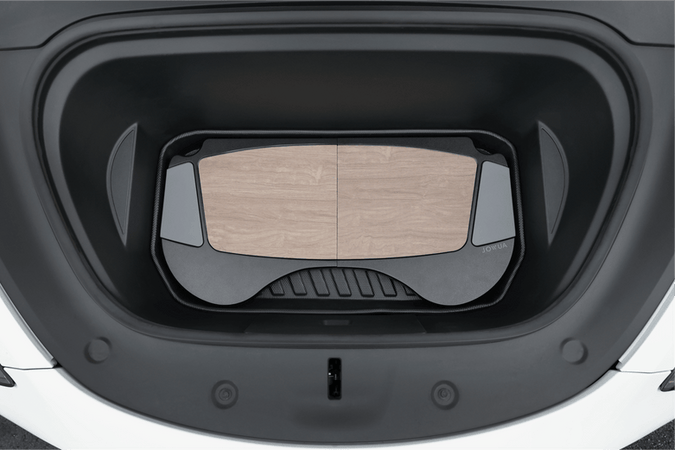 The JOWUA Model 3 All Weather Trunk Combo, designed for the reengineered Model 3 Highland (2024+), features a custom-fitted and stylish organizer for the front trunk (frunk). It is crafted with waterproof TPE material, wooden panels, and sleek black edges, seamlessly integrating as a modern trunk liner within the space.