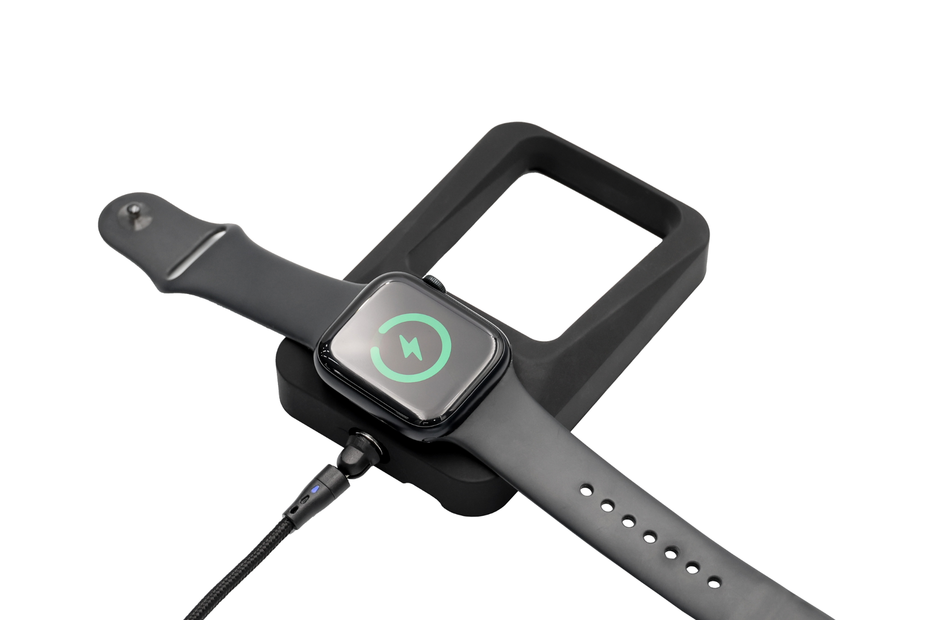 A black smartwatch charges on a rectangular black dock from JOWUA’s iPhone 17 Release Bundle, connected by a cable. Next to it is a MagSafe clear iPhone 17 case, with the watch display showing a green charging icon on white.