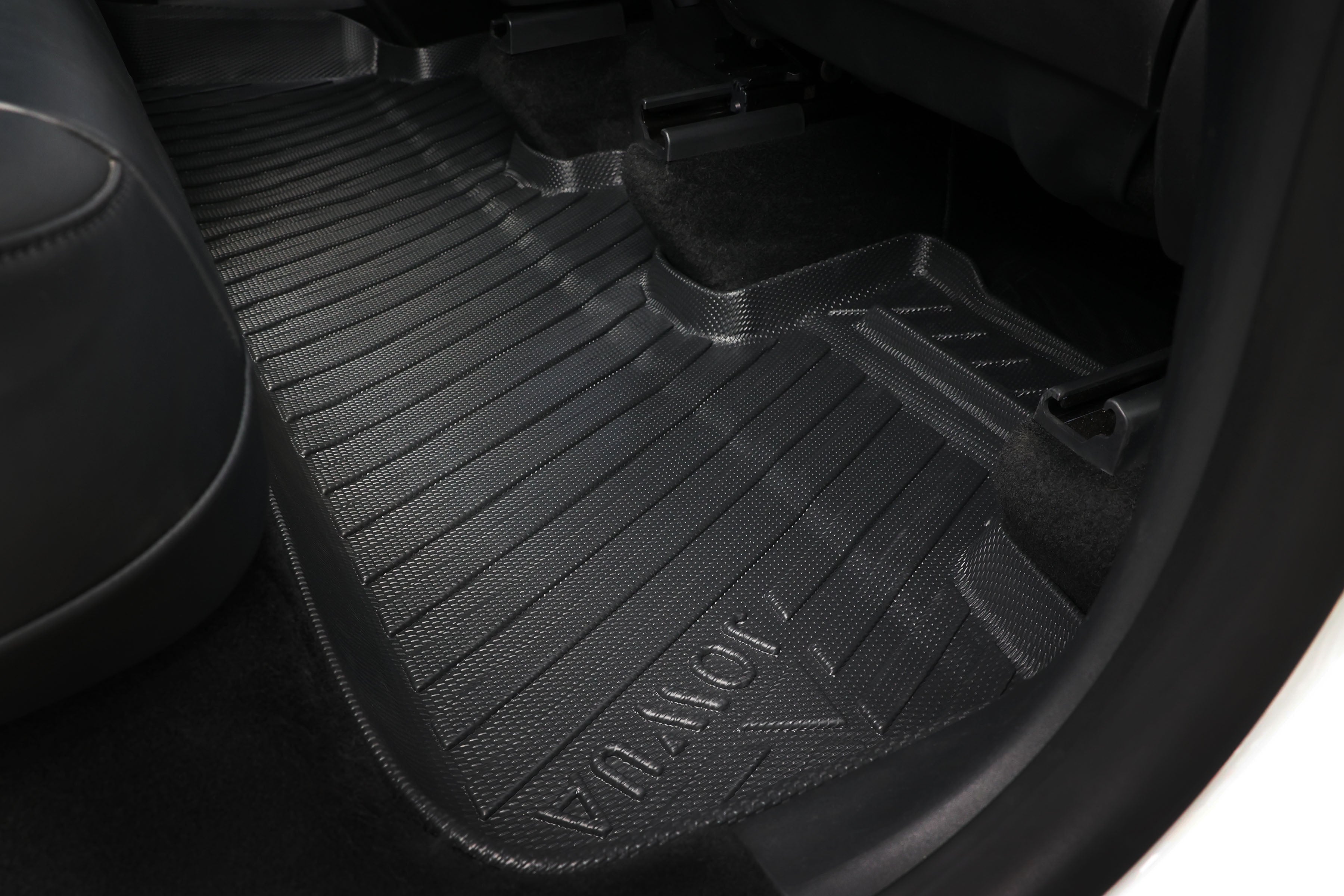 Close-up of a black all-weather floor mat from JOWUA