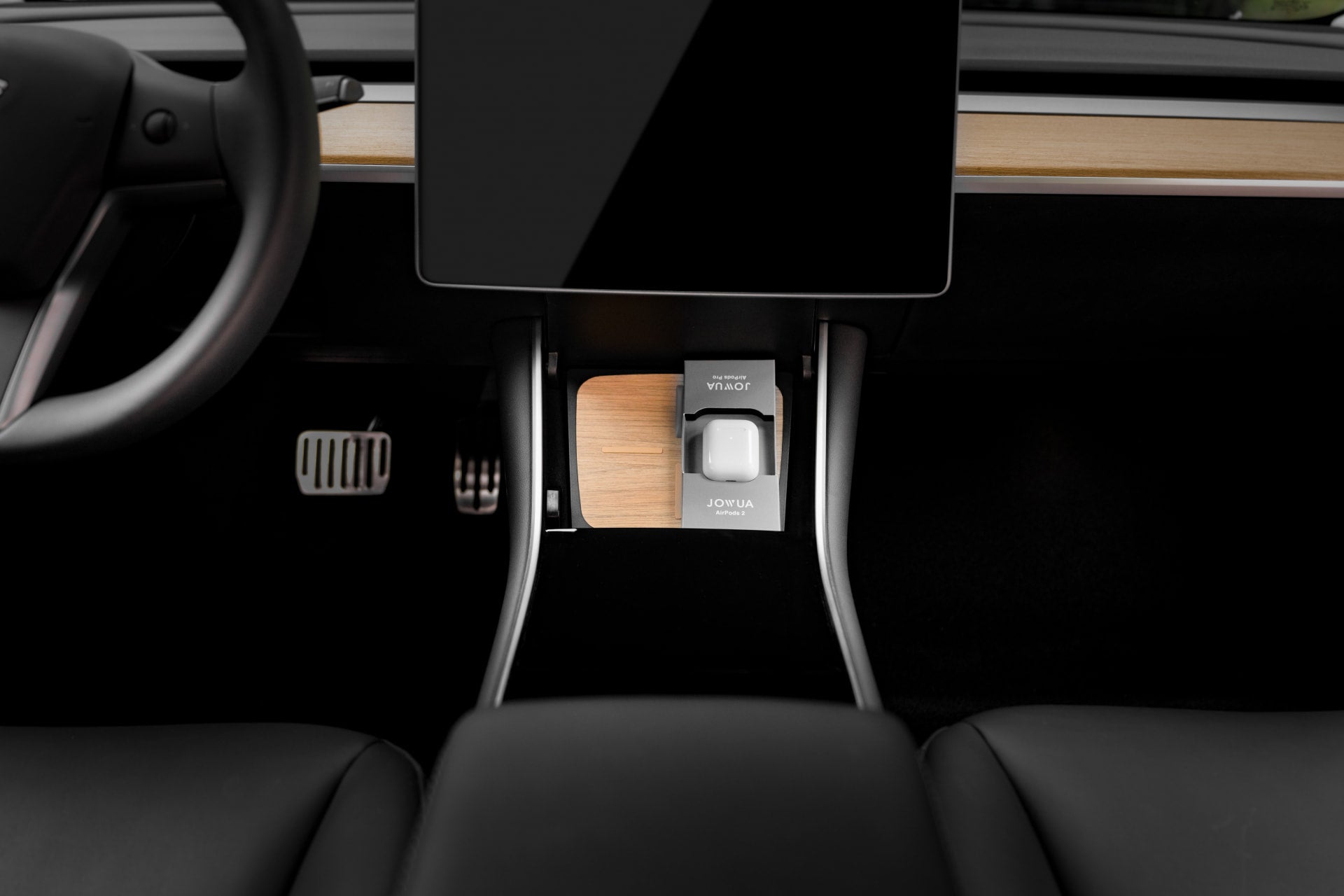 View of the AirPods Charger Stand by JOWUA, showcasing its sleek design with an integrated wireless charging pad for your devices.