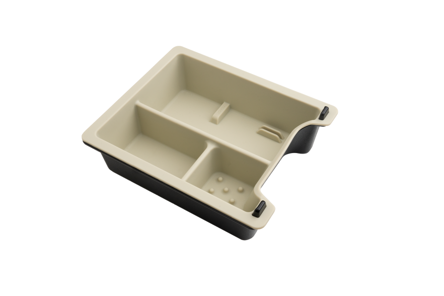 Introducing the JOWUA Center Console Tray Organizer for Tesla Model 3/Y, a beige and black tray featuring three compartments with rounded corners. Made from premium hybrid material, it offers a sleek finish and is perfectly designed to fit inside a drawer or serve as a center console organizer, enhancing both style and functionality.