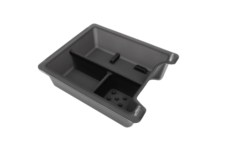 A rectangular plastic tray from JOWUA, designed with divided sections and a handle, made from premium hybrid material. This gray Center Console Tray Organizer is ideal for efficiently arranging items in your Tesla Model 3 or Y.