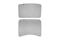 Two Model 3 / Reengineered Model 3 Glass Roof Sunshades by JOWUA are showcased from multiple perspectives. They feature a gentle curve and small black tabs at the top, all set against a plain white background, highlighting their enhanced UV protection capabilities.