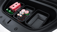 The JOWUA Under Seat Collapsible Organizer for Tesla Model X Y, designed for multipurpose use, holds a case of Coca-Cola cans, two green glass soda bottles, four Coca-Cola glass bottles, and a container of Häagen-Dazs ice cream. This foldable and expandable storage solution includes an empty compartment ready to be filled.