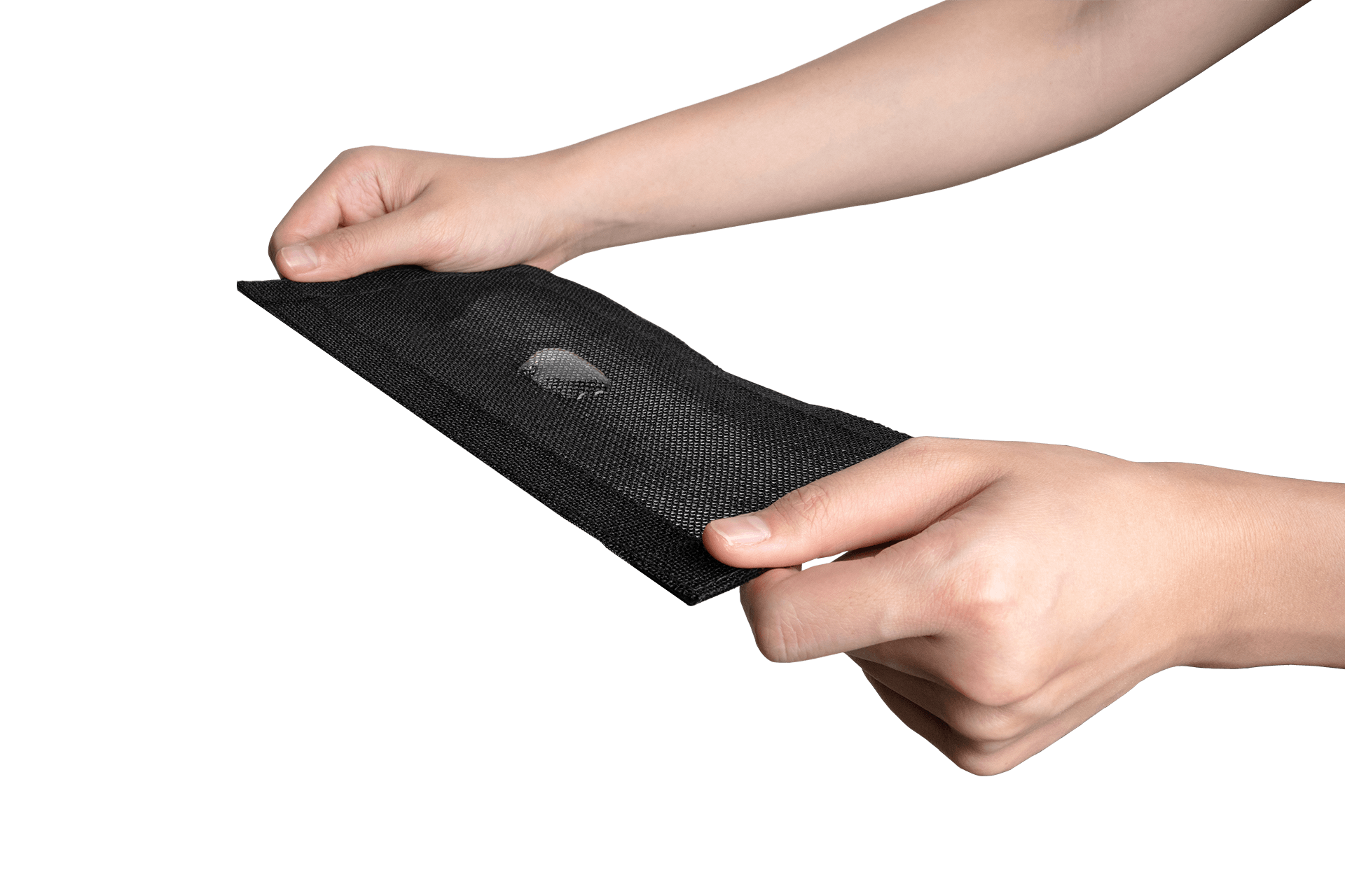 Hands holding and stretching a piece of JOWUA's black Rear Under Seat Air Vent Cover, highlighting its water-resistant and flexible properties.